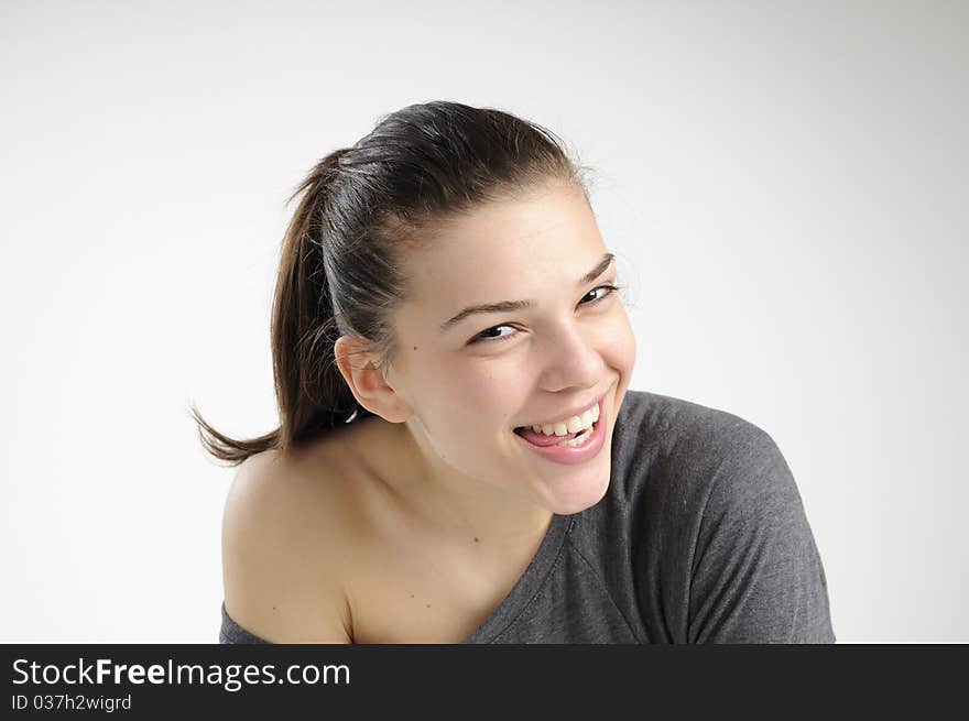 Cheerful woman having fun in studio. Cheerful woman having fun in studio