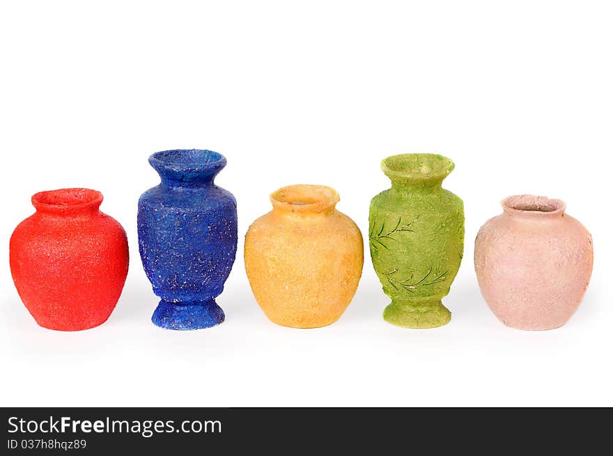 Multicolored ceramic vases. Isolated on the white