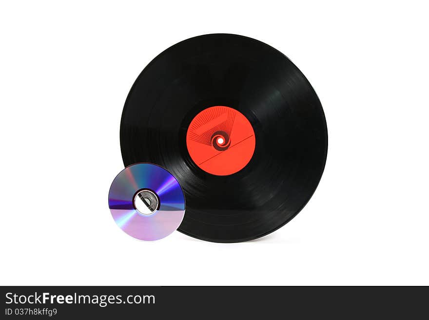 Old vinyl record and cd isolated on white background