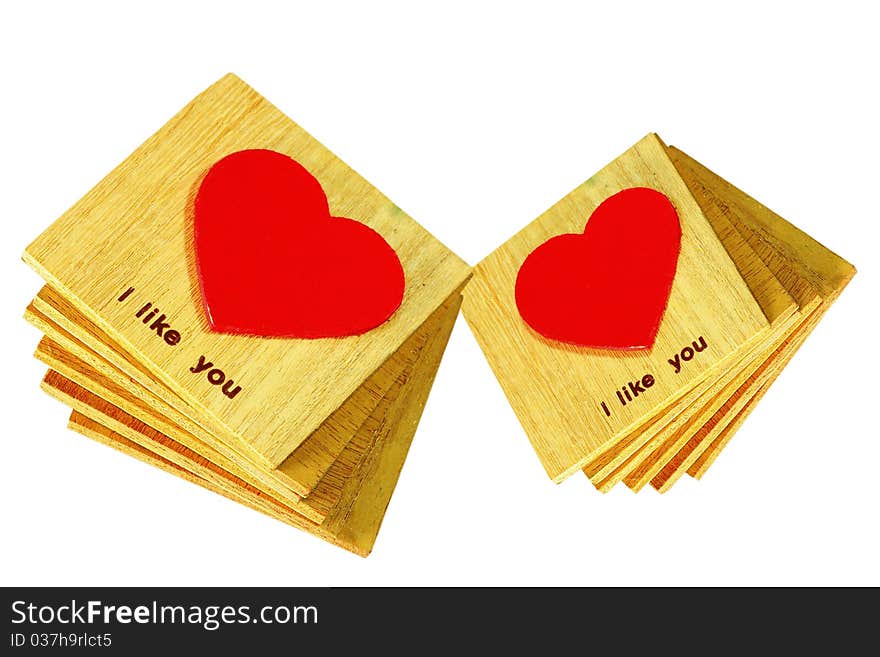 Wooden heart on white background