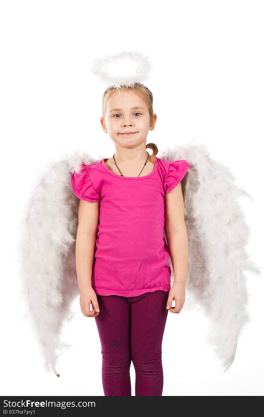 Beautiful girl in angel wings and nimbus