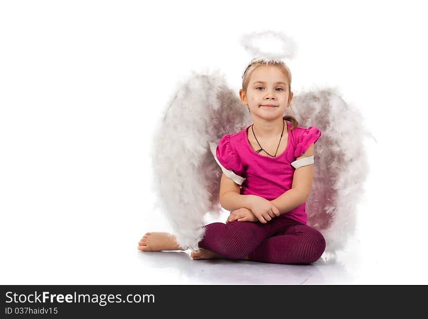 Beautiful girl in angel wings and nimbus isolated