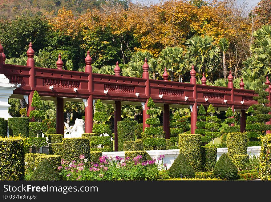 Red wooden bridge in the garden ,thailand