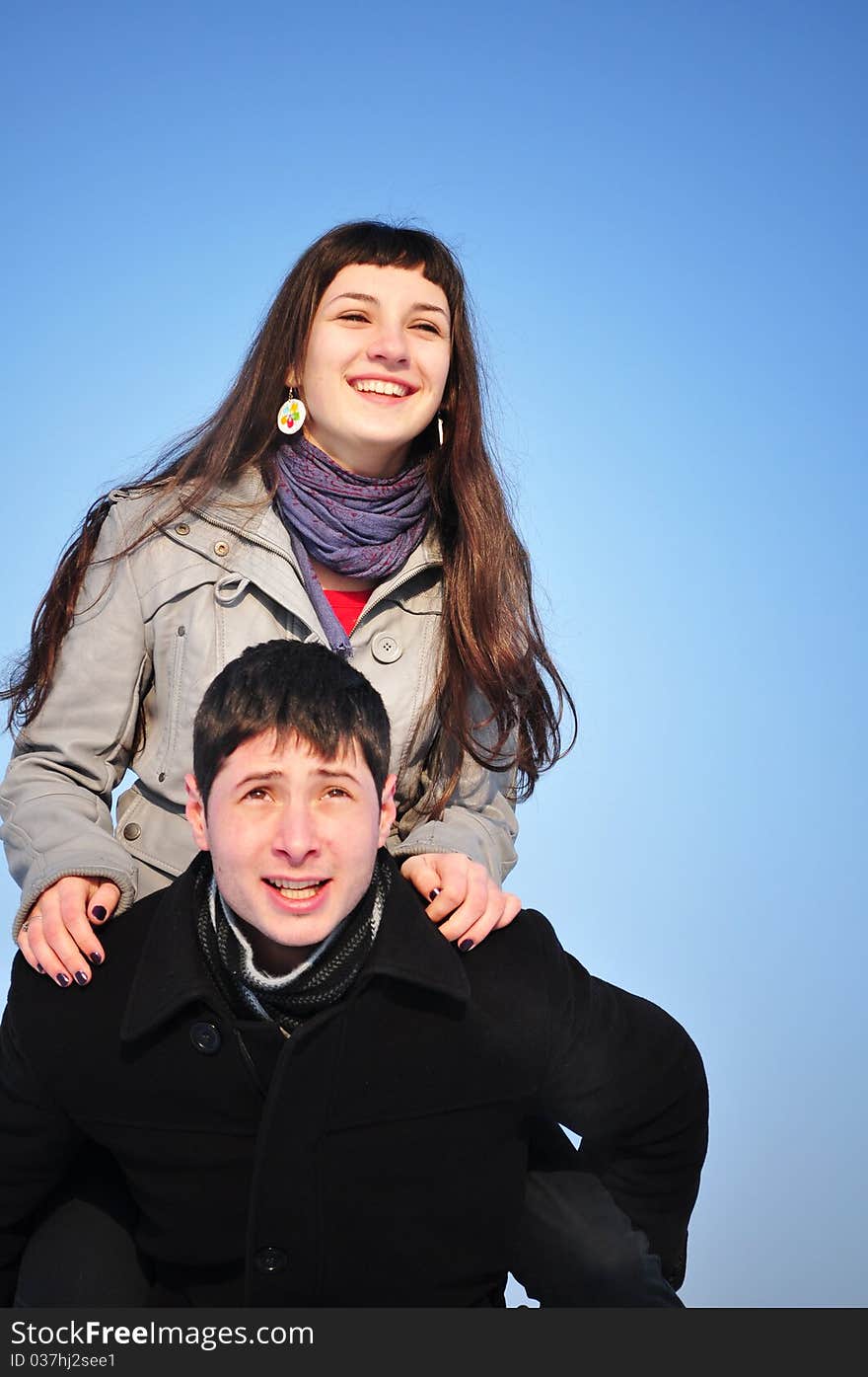 Happy Couple On Blue Sky