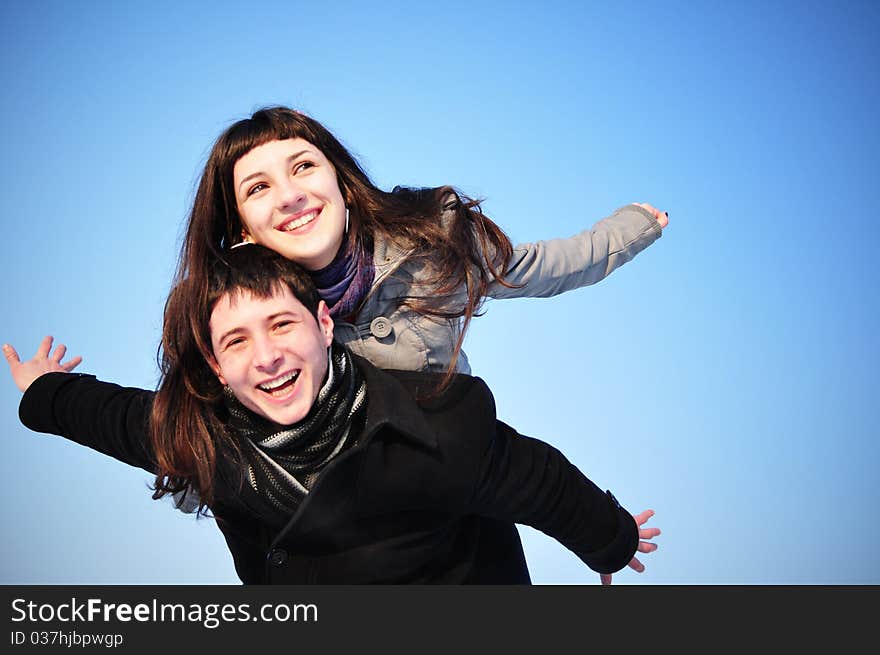 Happy Couple On Blue Sky