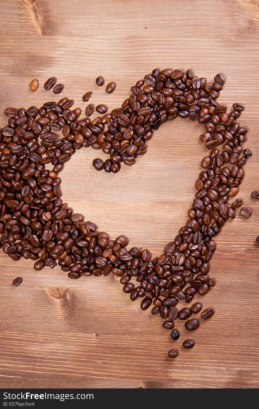 Fragrant fried coffee beans as a heart