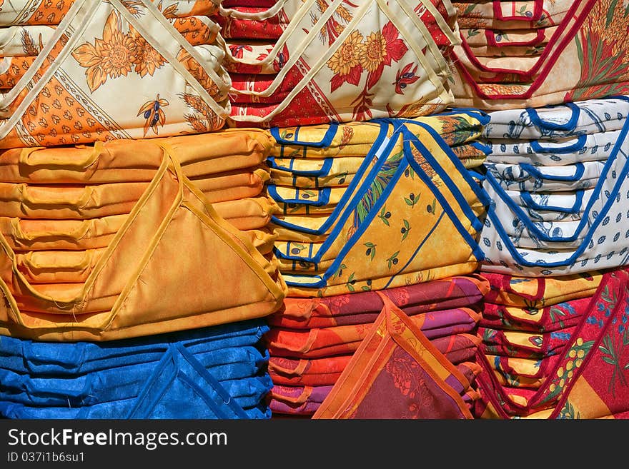 This midday shot of seat cushions was taken in a street market in Provence, France. This midday shot of seat cushions was taken in a street market in Provence, France.