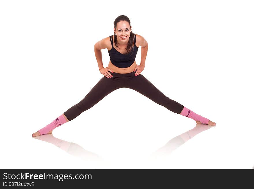 Photo of a young girl doing a fitness exercises