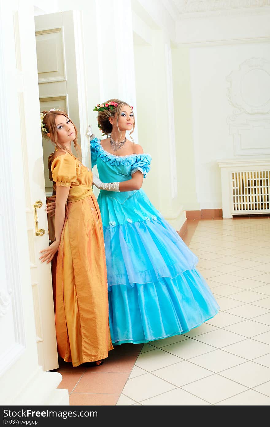 Two beautiful women in medieval era dresses. Two beautiful women in medieval era dresses.