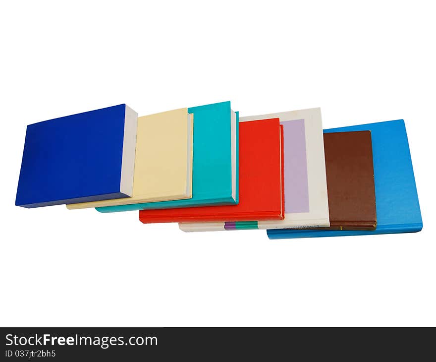 Pile of books isolated on white colorful