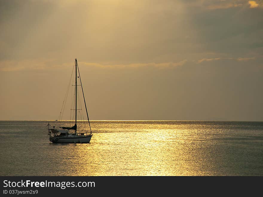 One ship in the ocean with sun beam. One ship in the ocean with sun beam.