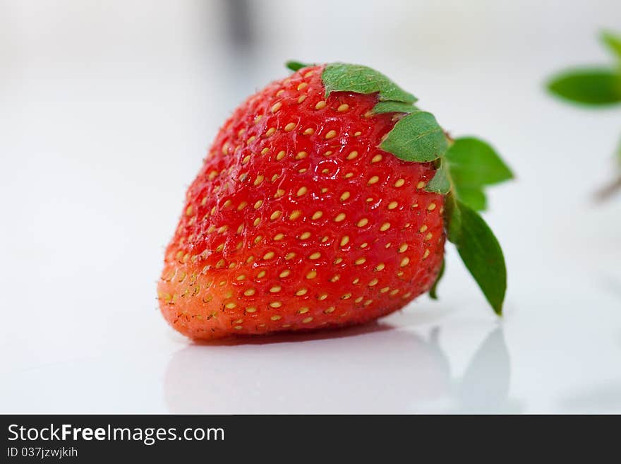 Beautiful strawberries isolated on white, a close-up