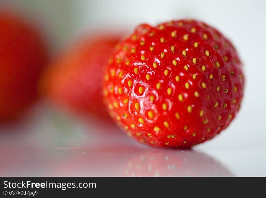 Beautiful strawberries isolated on white, a close-up