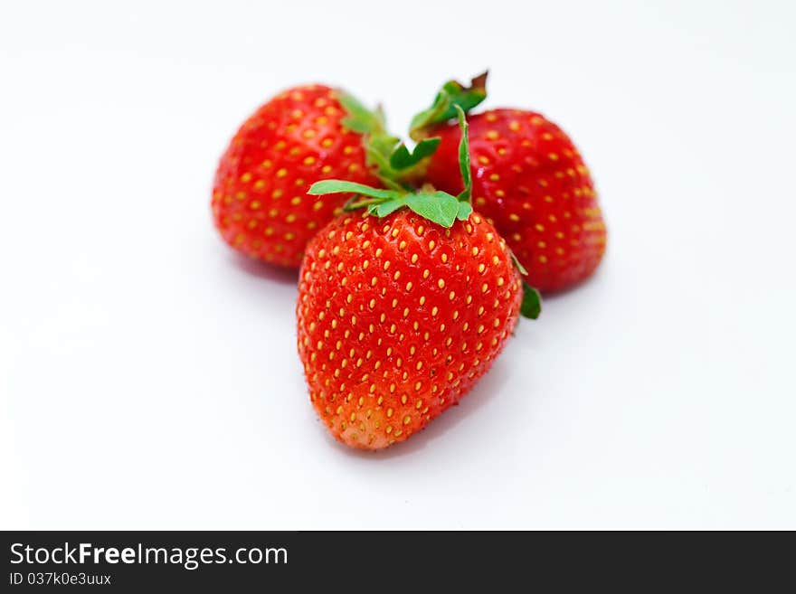 Beautiful strawberries isolated on white, a close-up