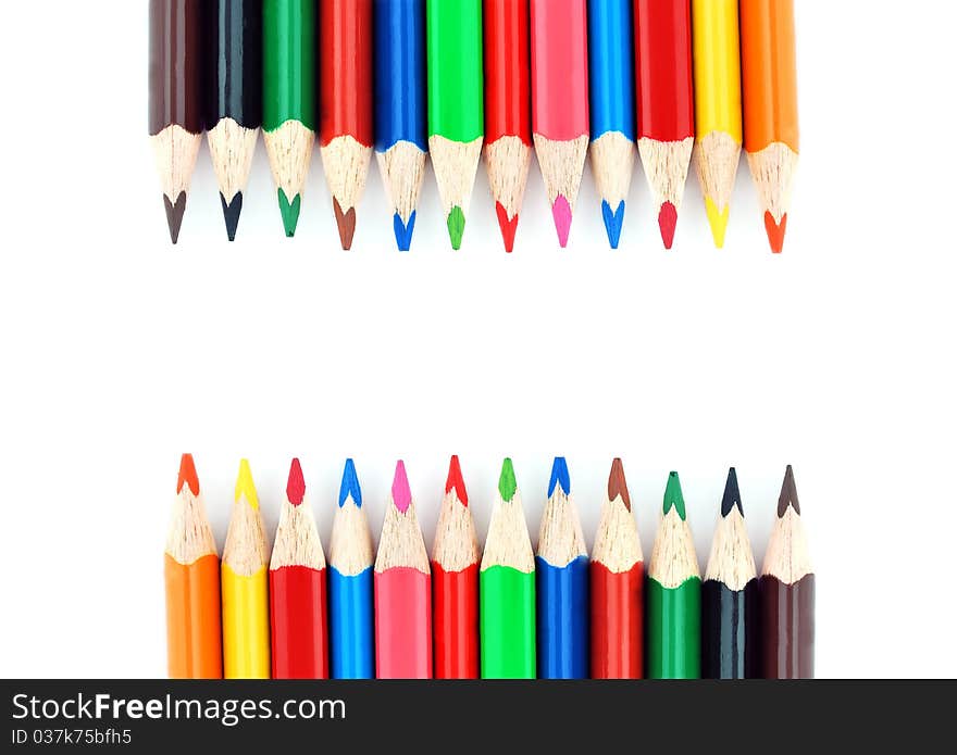 Colour pencils isolated on white background close up