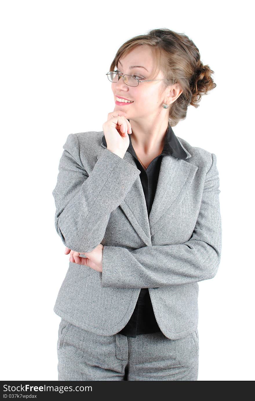 Beautiful young woman posing in business suit and glasses. Isolated over white background. Beautiful young woman posing in business suit and glasses. Isolated over white background.