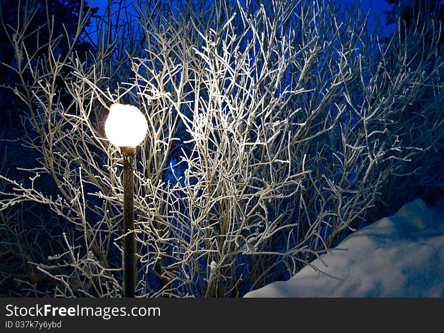 Light of a lantern in the frosty morning