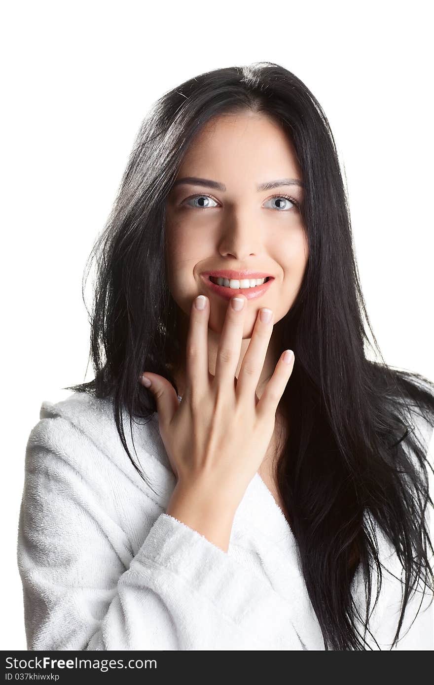 Portrait of fresh and beautiful brunette woman on white background wearing white bathrobe. Portrait of fresh and beautiful brunette woman on white background wearing white bathrobe