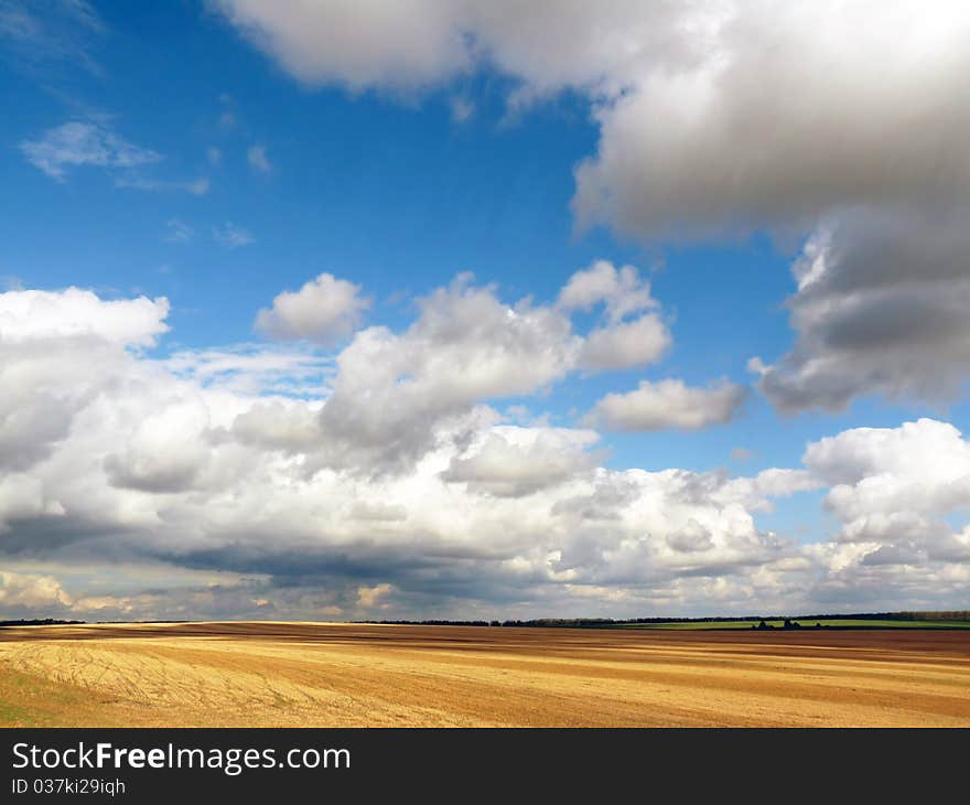 Mown wheat field and a beautiful sky