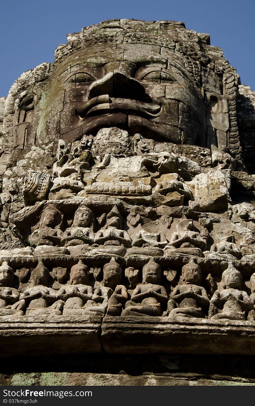 A bayon face at Angkor, Siem Reap, Cambodia. A bayon face at Angkor, Siem Reap, Cambodia.