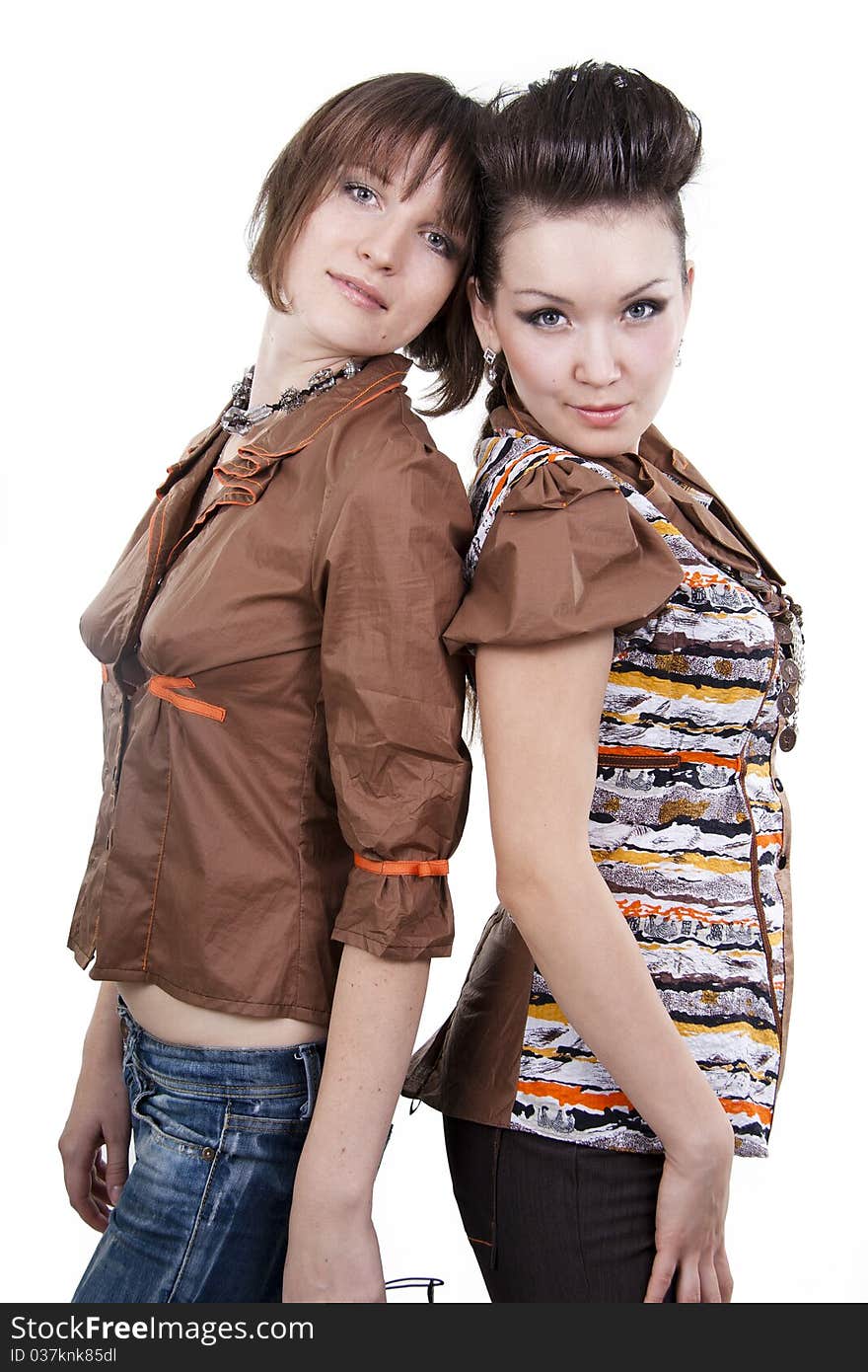 Two different girl show fashionable stylish clothes. Two different girl show fashionable stylish clothes