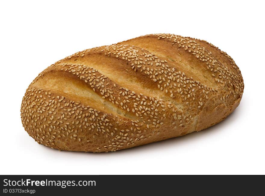 Loaf of  fresh wheat  bread, isolated on white background.