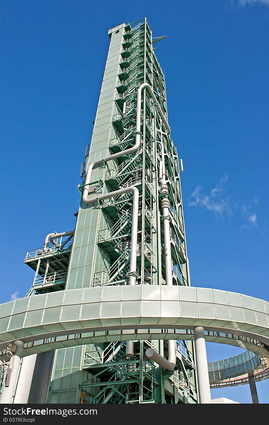 Burning tower of Fuel gas with blue sky as background