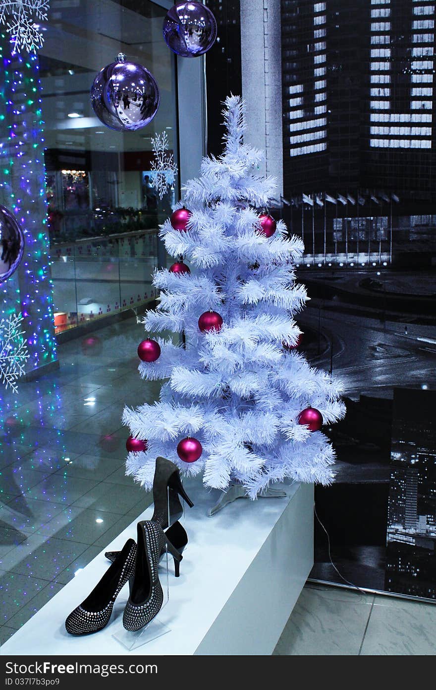 Decoration with Christmas symbols of showcase mall in the winter. Decoration with Christmas symbols of showcase mall in the winter