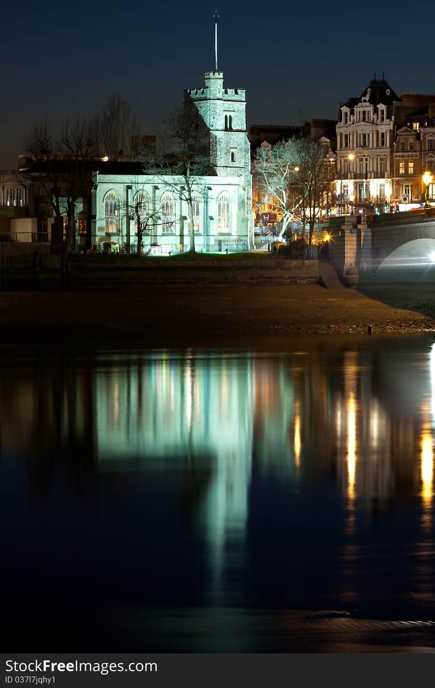 Church by a river also being reflected at night. Church by a river also being reflected at night