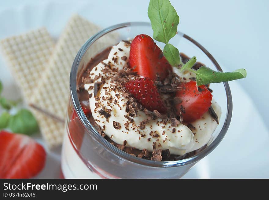 Strawberry dessert with chocolate crunch. Strawberry dessert with chocolate crunch