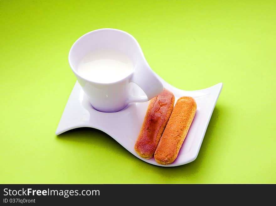 Cup with milk and crakers