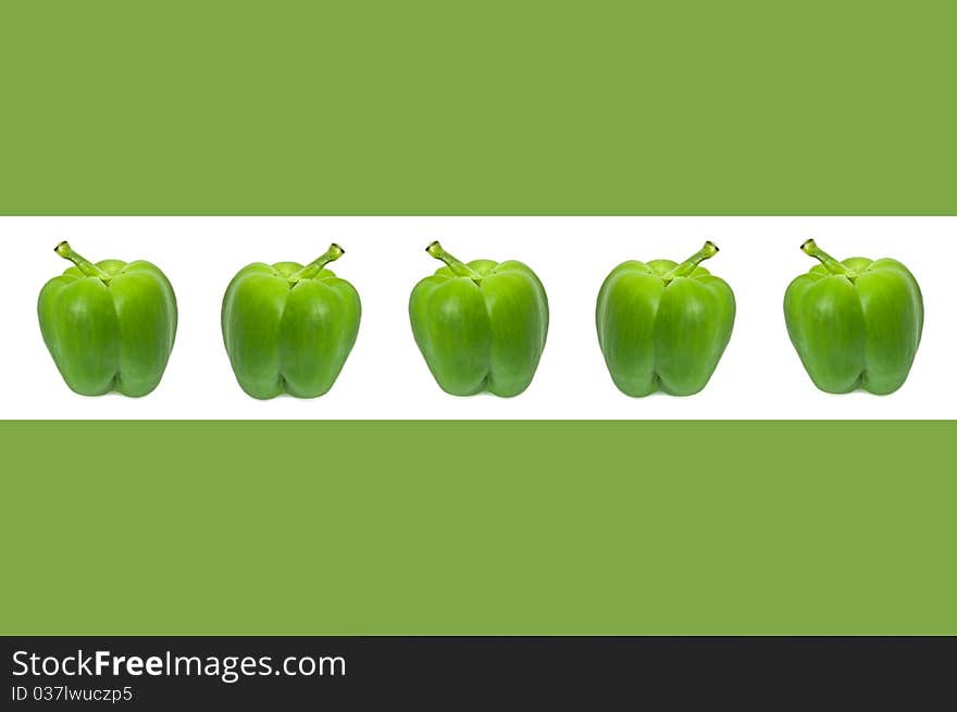 A horizontal white border accross the centre of a green image containing five small green bell peppers. A horizontal white border accross the centre of a green image containing five small green bell peppers.