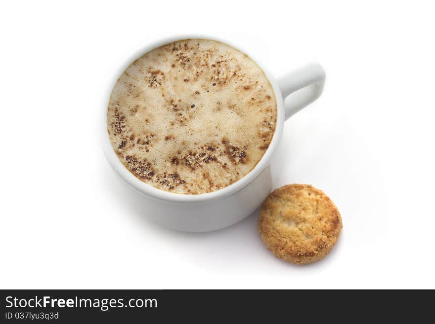 White Cup of coffee with small cookie isolated on white background. White Cup of coffee with small cookie isolated on white background