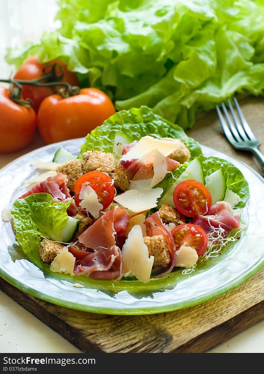 Fresh salad from vegeatbles, ham and cheese