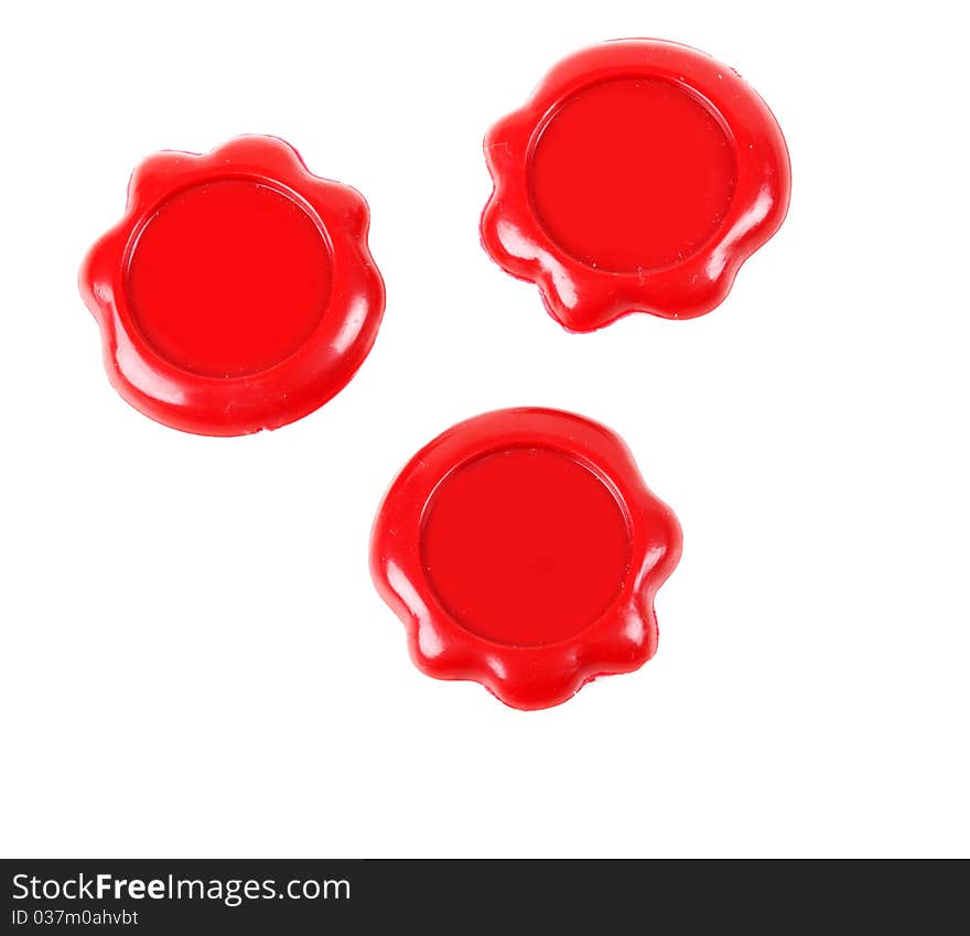 Three red seal on a white background