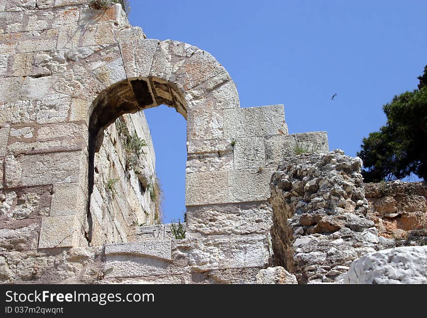 A set of arches at the ancient site of Acropolis in Athens, Greece. A set of arches at the ancient site of Acropolis in Athens, Greece.