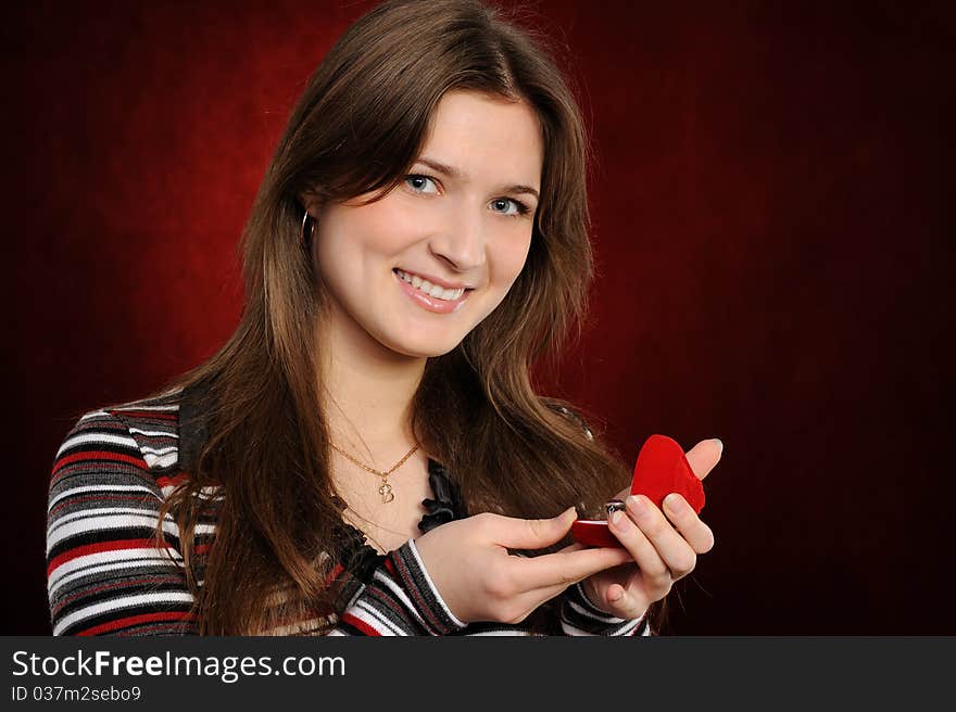 Young Woman With A Heart Gift