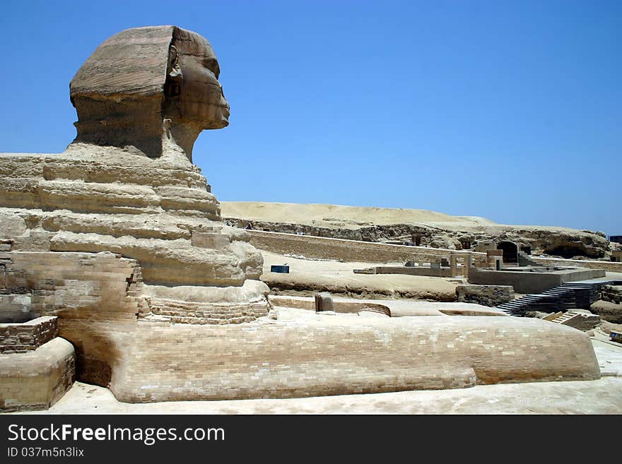 The Sphinx found in Cairo, Egypt with desert and pyramids in the background. The Sphinx found in Cairo, Egypt with desert and pyramids in the background.