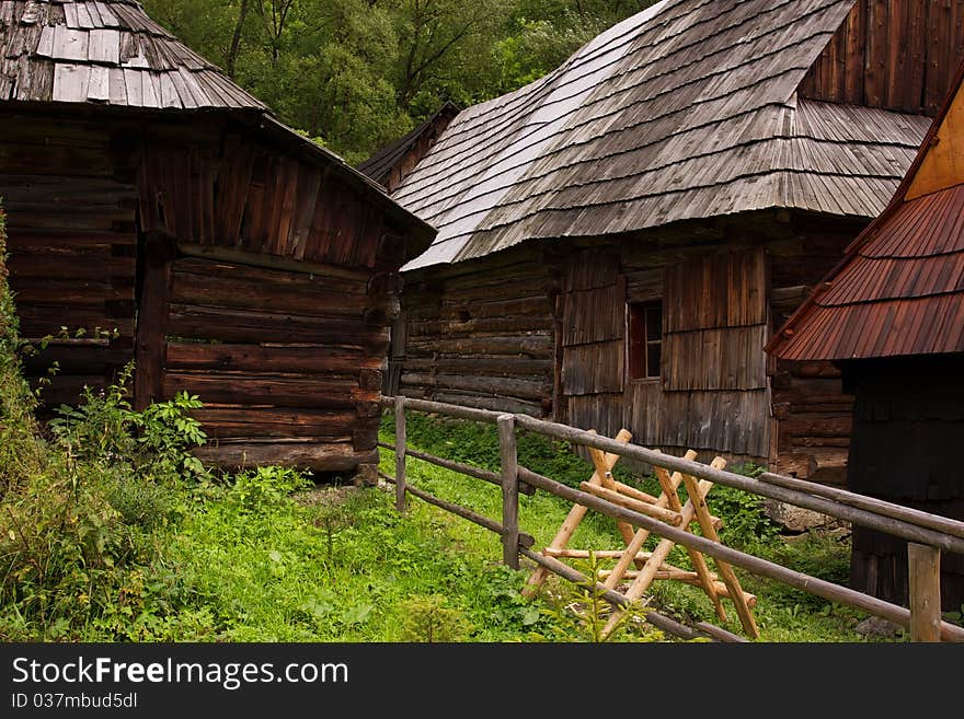 Row of Traditional Slovakian Timber Houses with Wooden Roof.