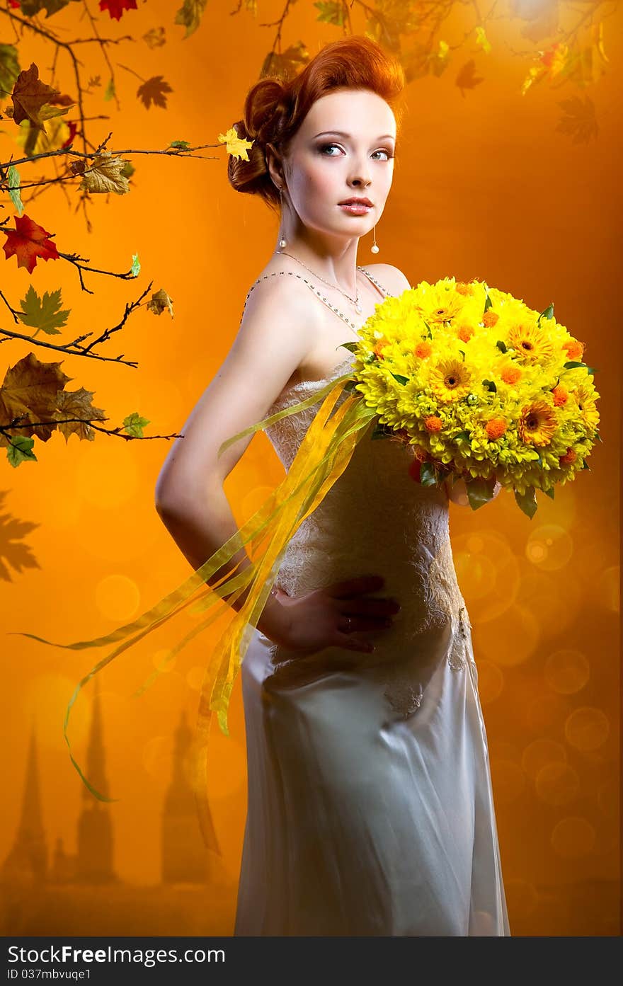 Lovely bride with a bouquet of flowers