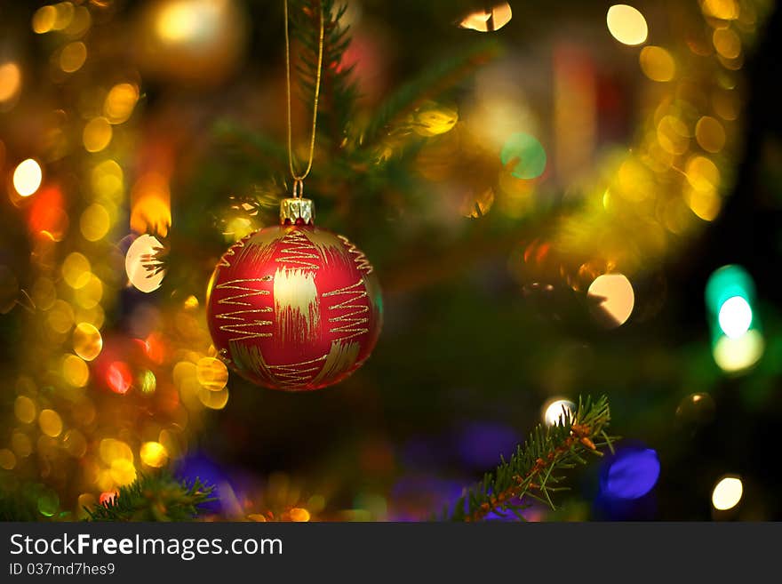 Beautiful Christmas ball on the tree - Defocused