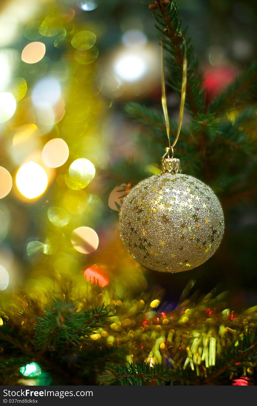 Beautiful Christmas ball on the tree - Defocused