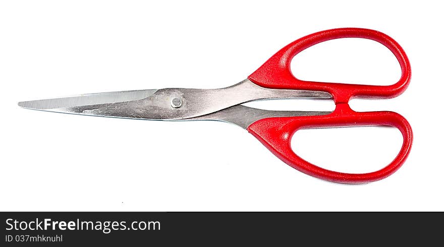 Red scissors isolated on white