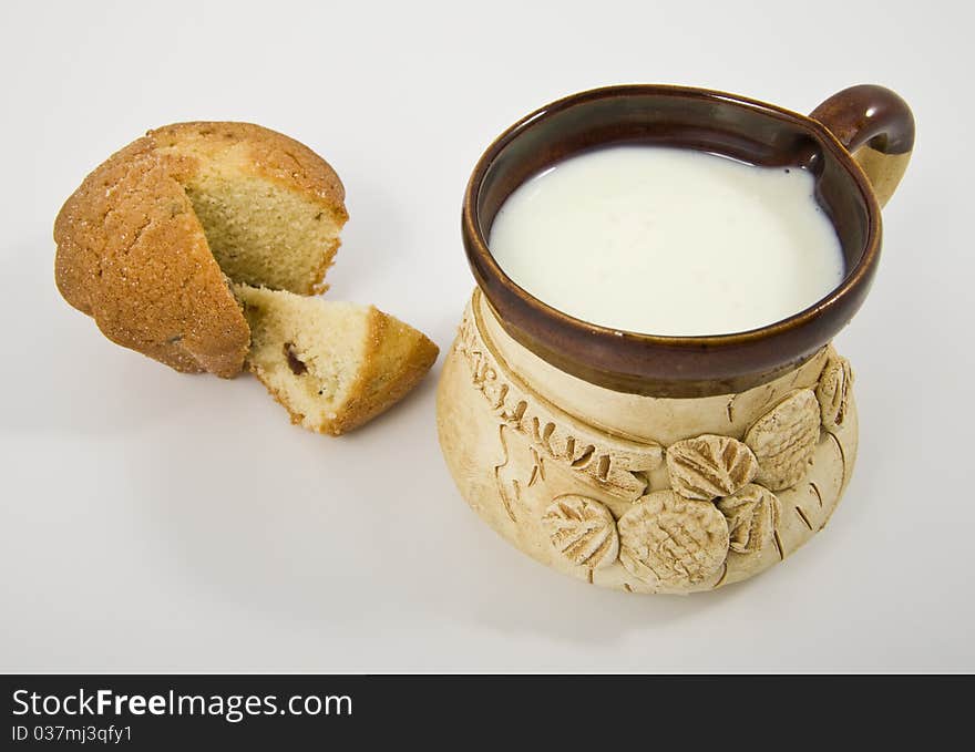 Mug Of Milk And Cake