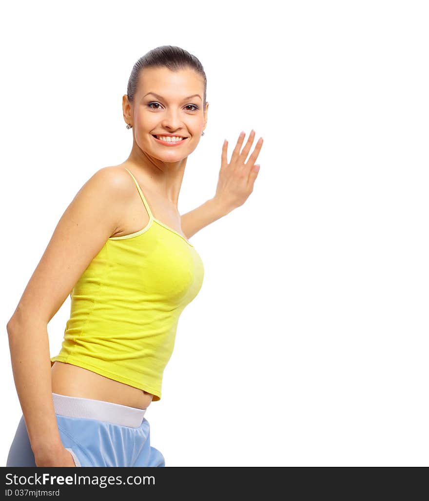 Portrait of a smiling young woman with blank bill board over white background