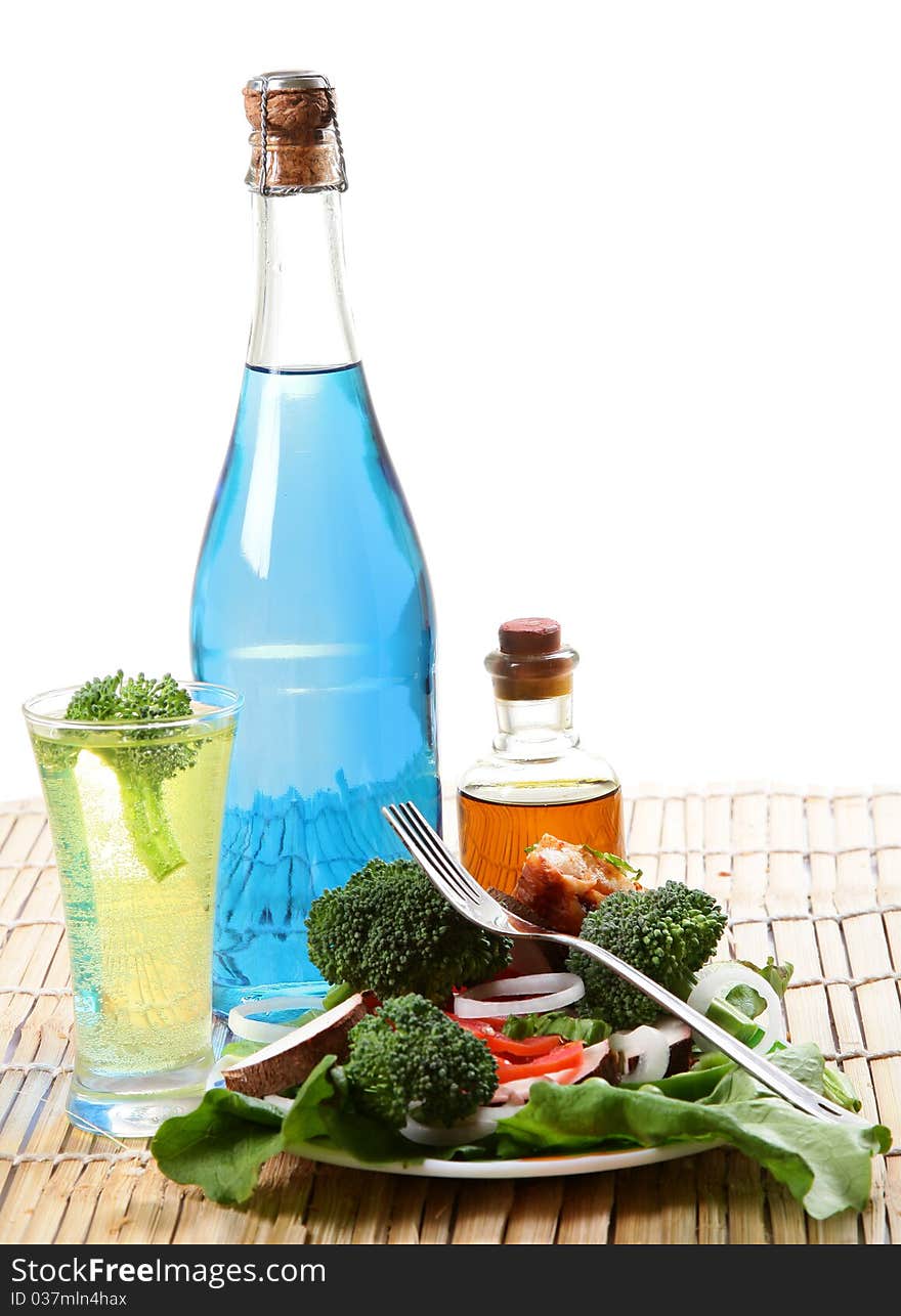 Veggie salad with drinks isolated on white background. Veggie salad with drinks isolated on white background.