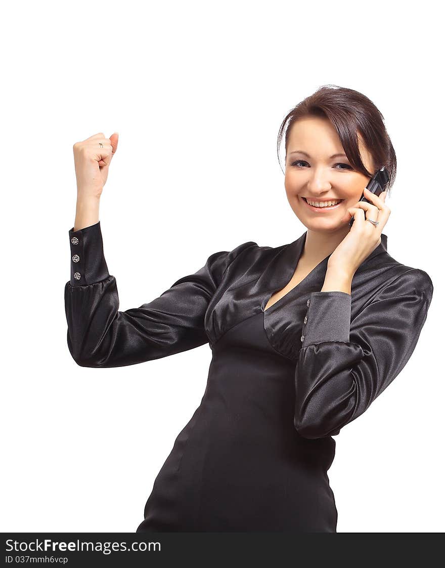 Portrait of a happy young businesswoman talking on cellphone against white background. Portrait of a happy young businesswoman talking on cellphone against white background