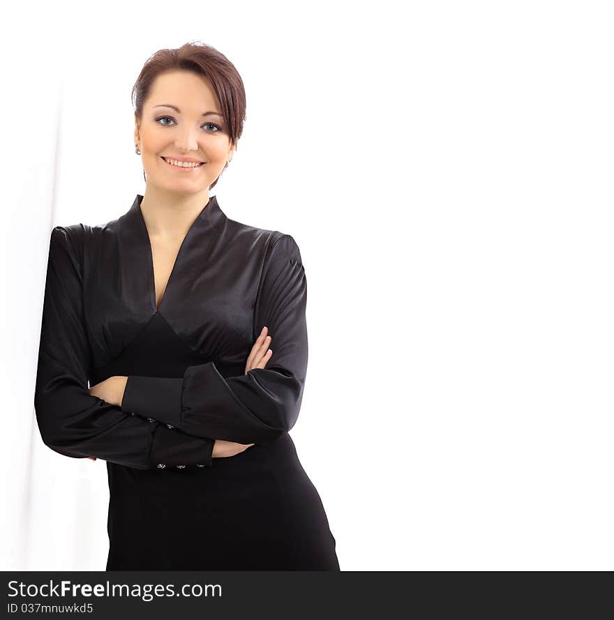 Portrait of a pretty young business woman standing isolated on white background. Portrait of a pretty young business woman standing isolated on white background