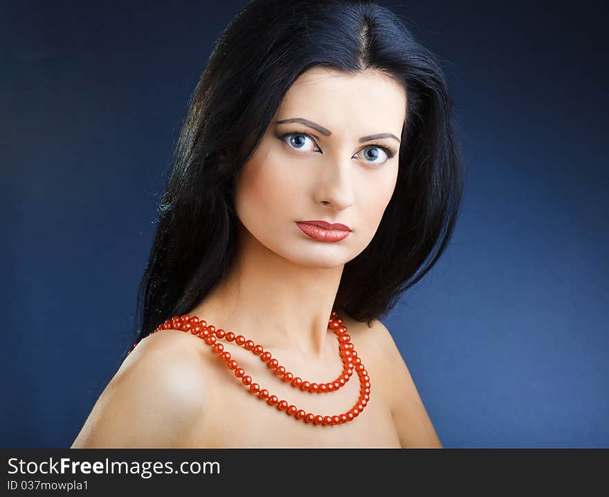 Portrait of elegant beautiful woman wearing jewelry.