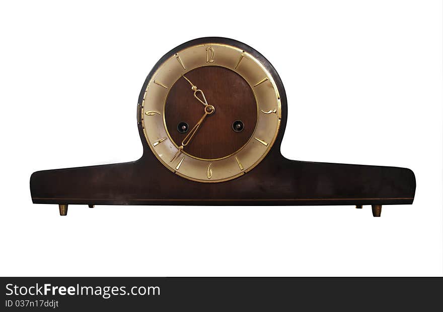 A vintage mantel clock wooden with gold numbers and hands